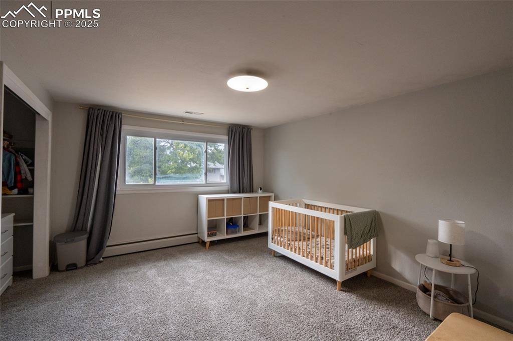 Image 15 of 49: Bedroom 1 with dual closets - upper floor