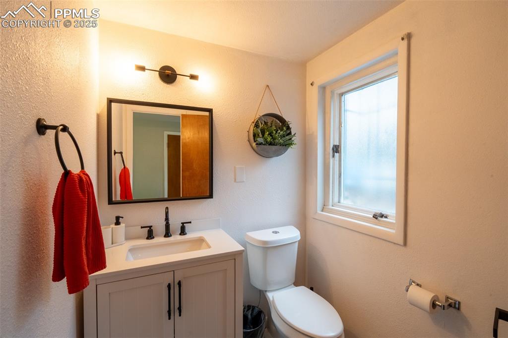 Image 29 of 49: Bathroom 3 (half) - lower level (currently being used as an air B&B)