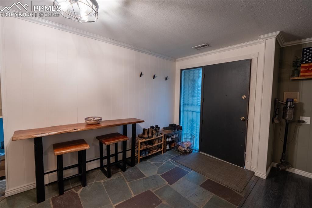 Image 3 of 49: Entry of home - main floor