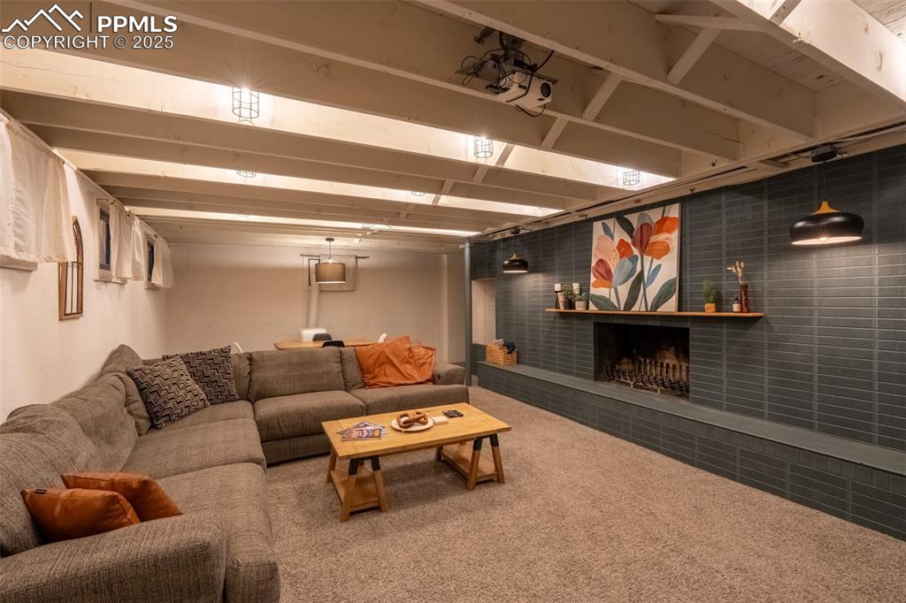 Image 33 of 49: Second living room - lower level (currently being used as an air B&B)