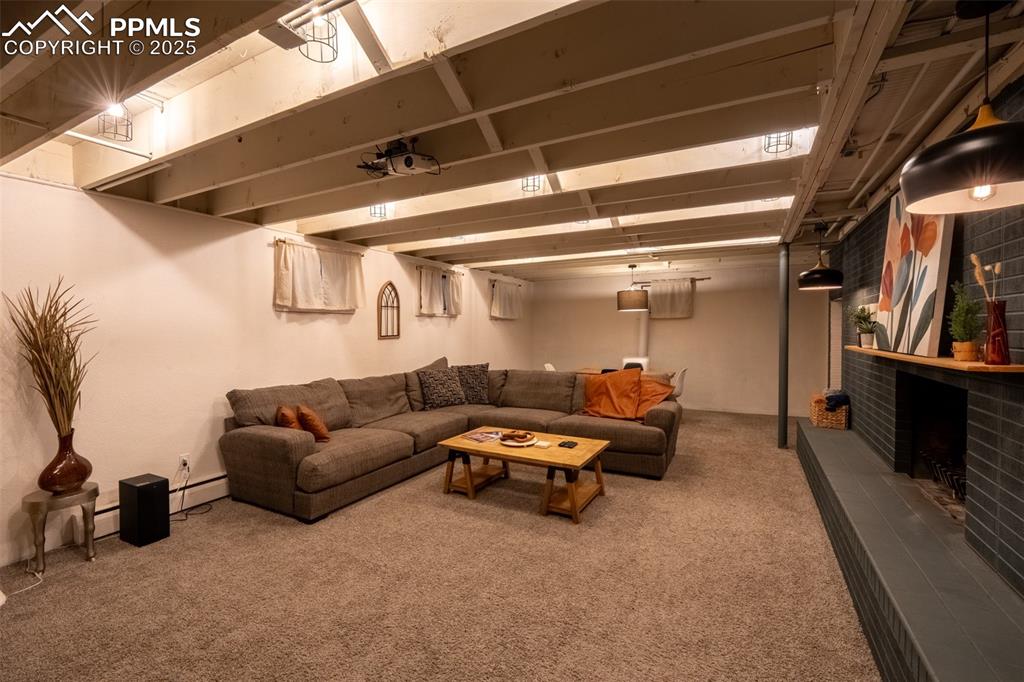 Image 34 of 49: Second living room - lower level (currently being used as an air B&B)