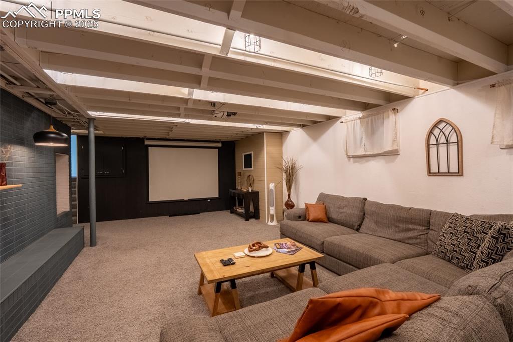 Image 37 of 49: Second living room - lower level (currently being used as an air B&B)