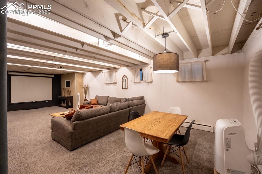 Image 38 of 49: Second living room - lower level (currently being used as an air B&B)