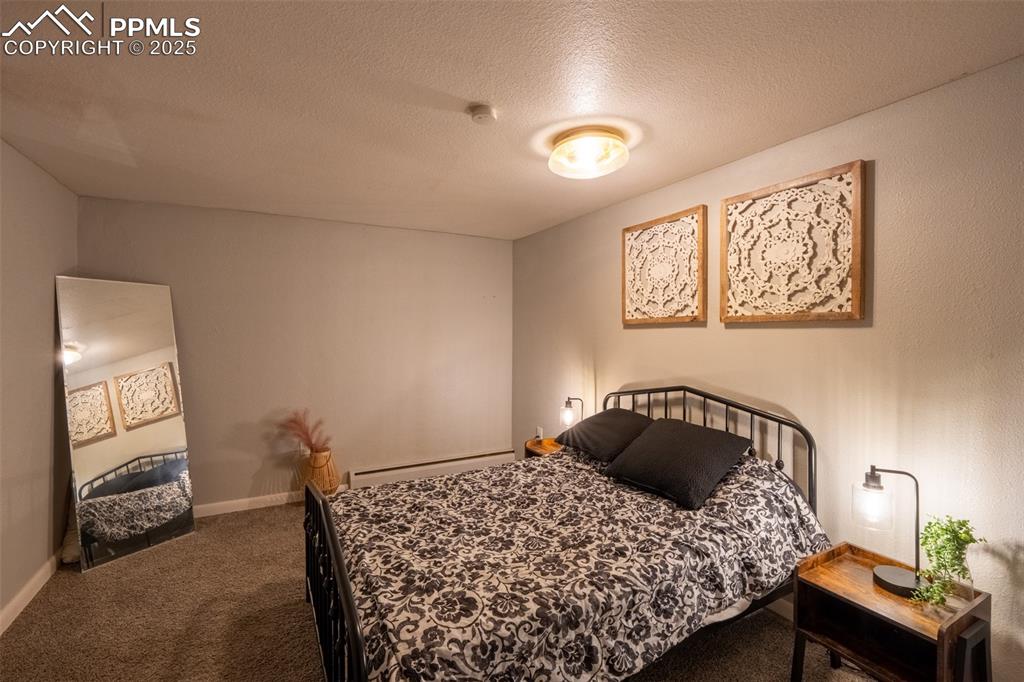 Image 41 of 49: Bedroom 6 - lower level (currently being used as an air B&B)