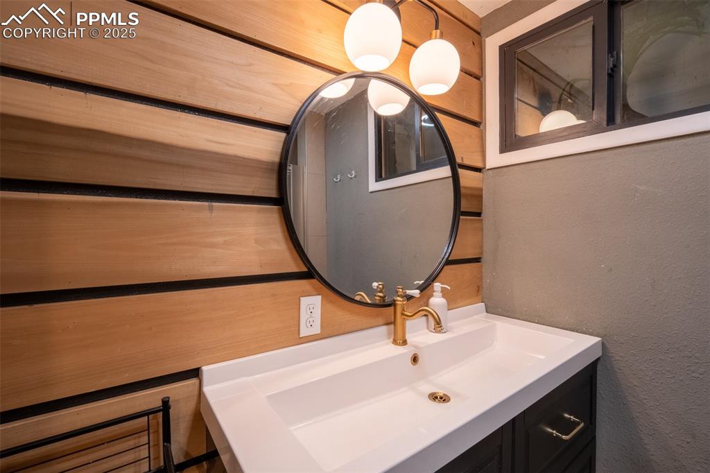 Image 42 of 49: Bathroom 4 (3/4) - lower level (currently being used as an air B&B)