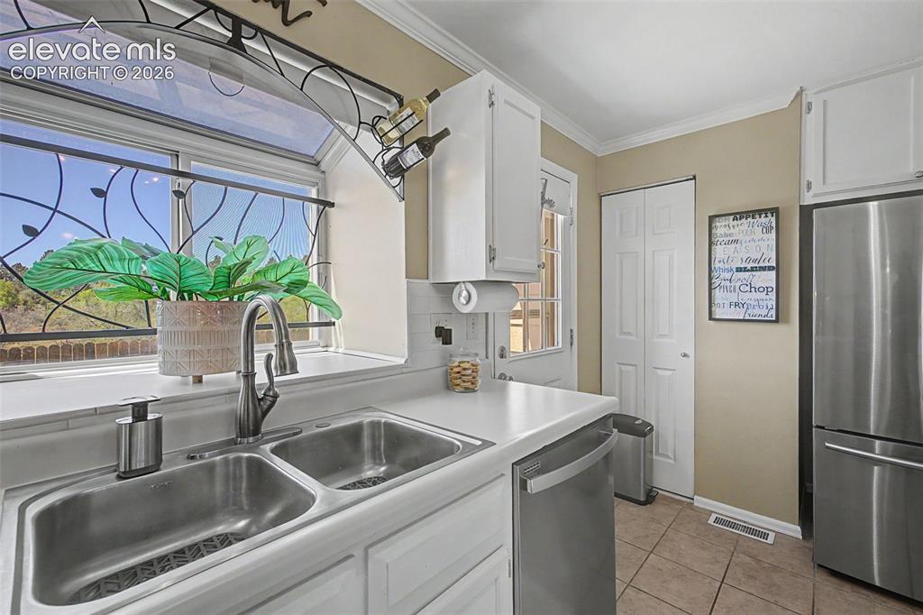 Image 16 of 31: Enjoy your view out the kitchen window