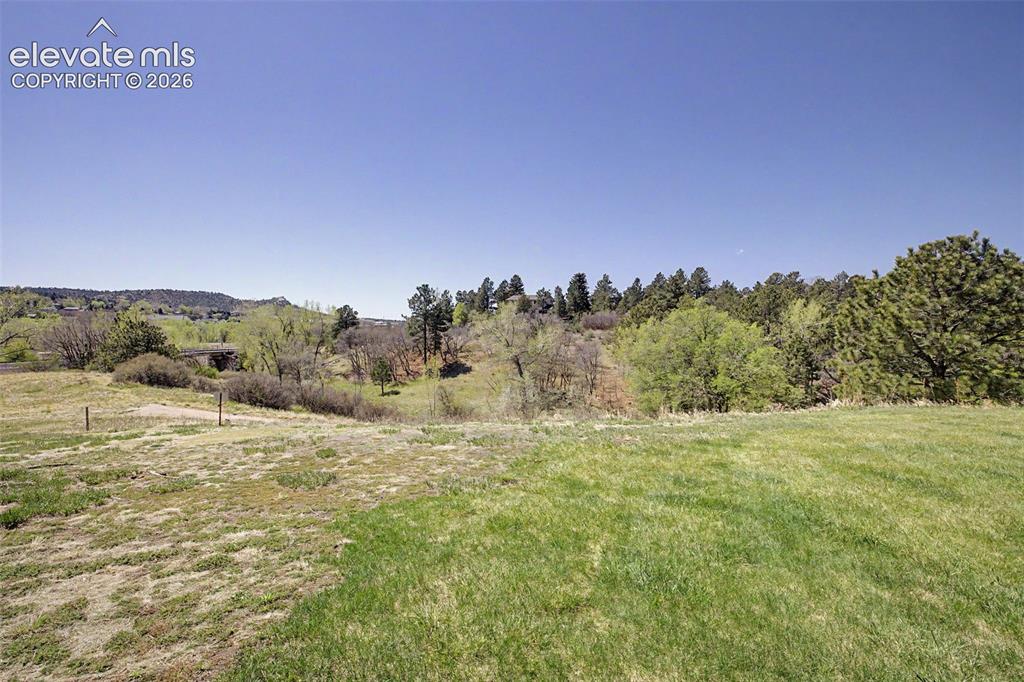 Image 25 of 31: Expansive open space at rear of property