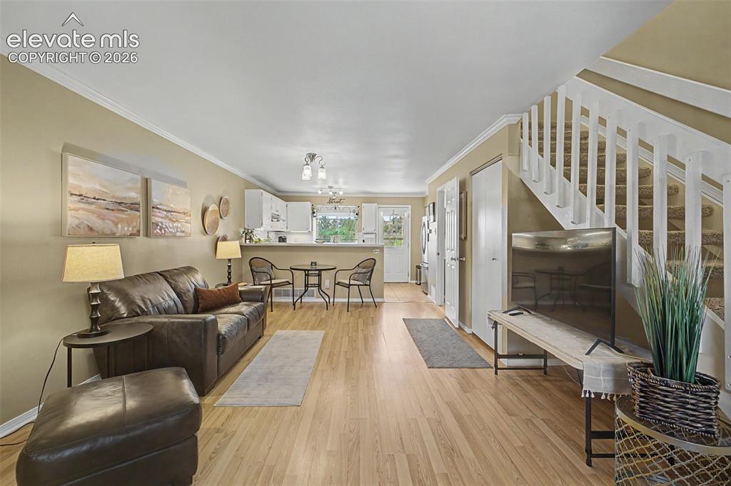 Image 5 of 31: Living area featuring open floorplan