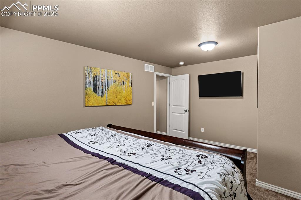 Image 34 of 49: Bedroom