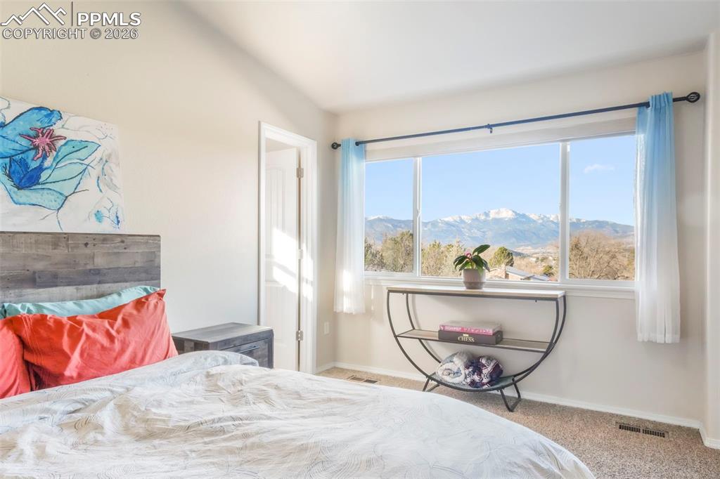 Image 20 of 50: Master Bedroom