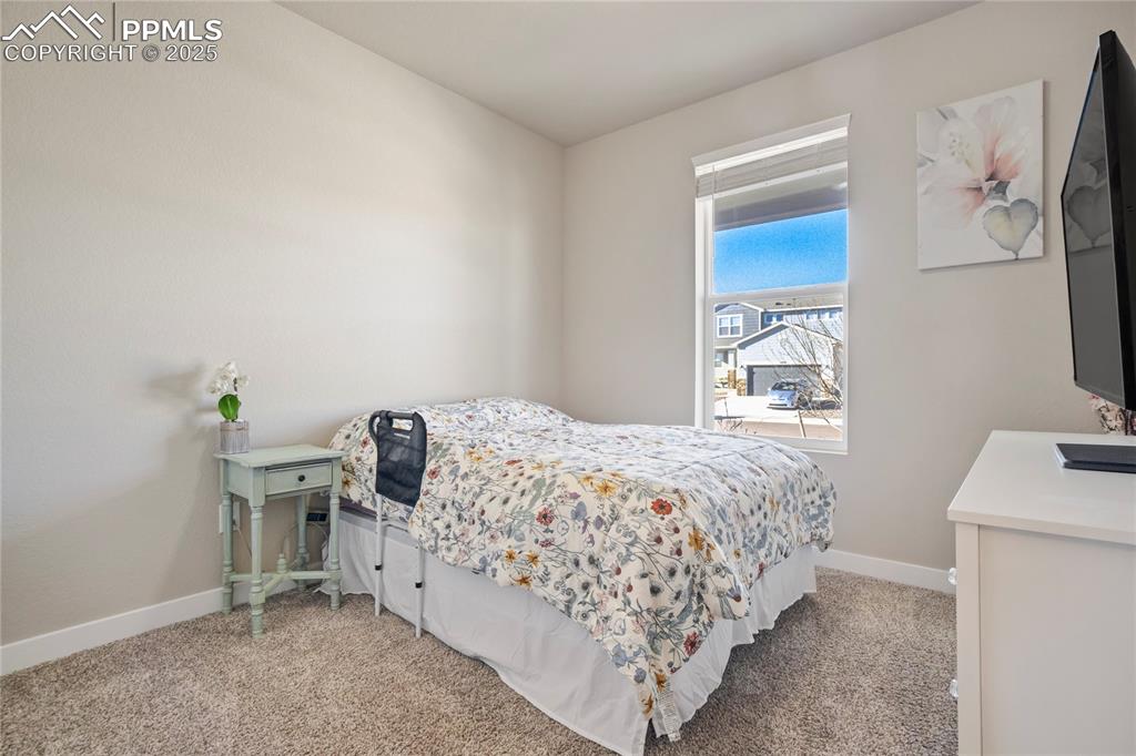 Image 24 of 49: Bedroom