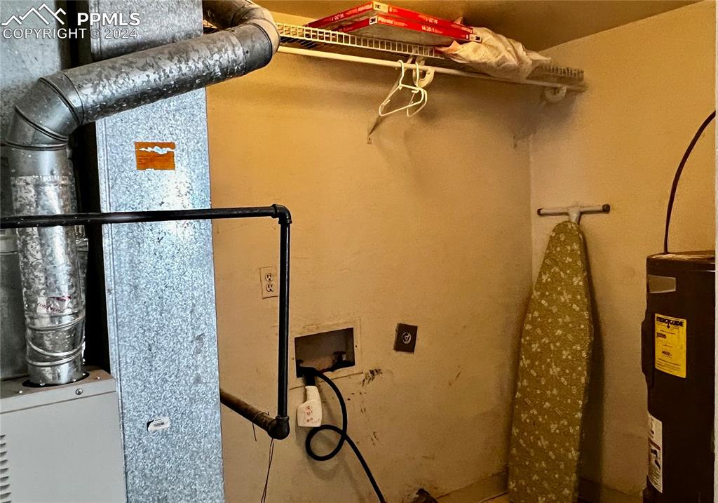 Image 18 of 23: Laundry and mechanical space