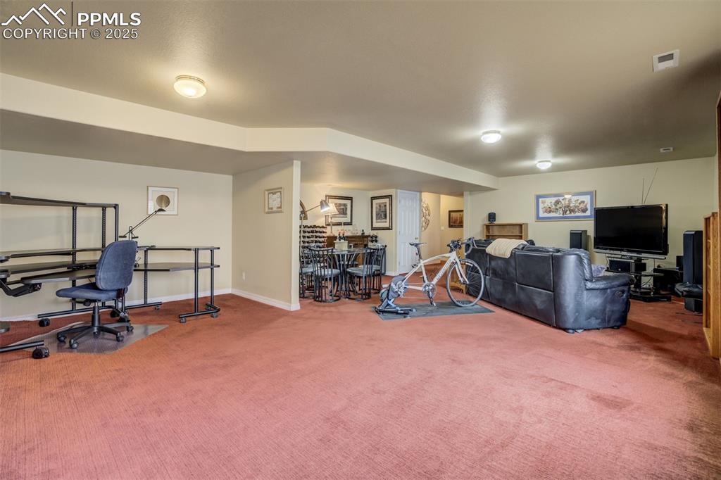 Image 33 of 50: Basement Large Family Room area, currently used as a Family Room, Office, D