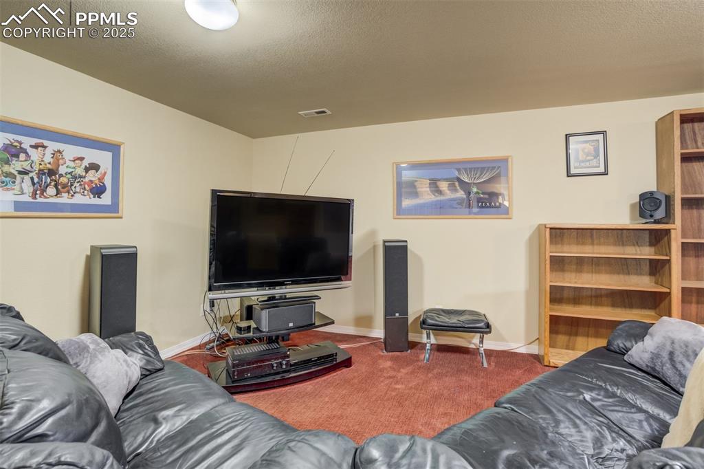 Image 34 of 50: Basement Family Room area.