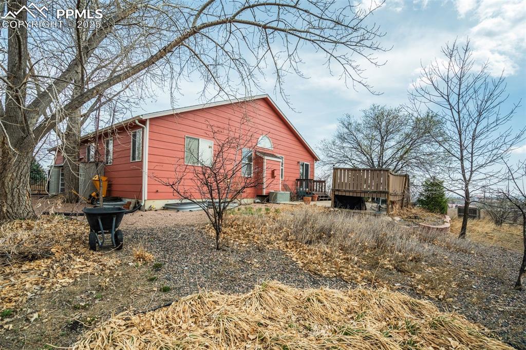 Image 45 of 50: View of the back of the home.