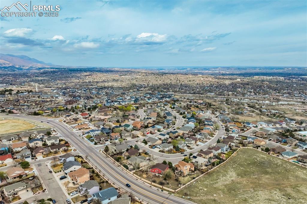 Image 48 of 50: Drone / aerial view showing the home front and center of the picture.