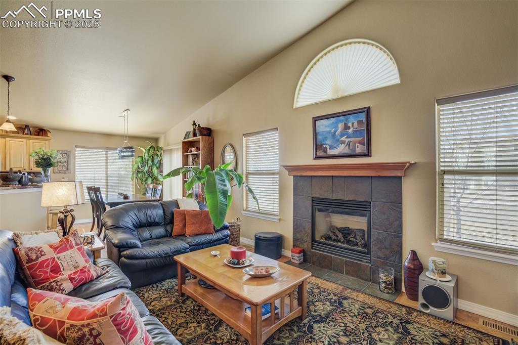 Image 7 of 50: Open Floor Plan, looking from the Living Room area to the Dining Room area