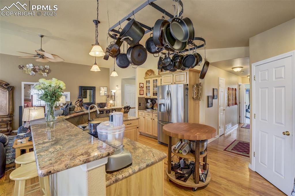 Image 9 of 50: Open Floor Plan. Kitchen open to the Living Room area. Kitchen has beauti