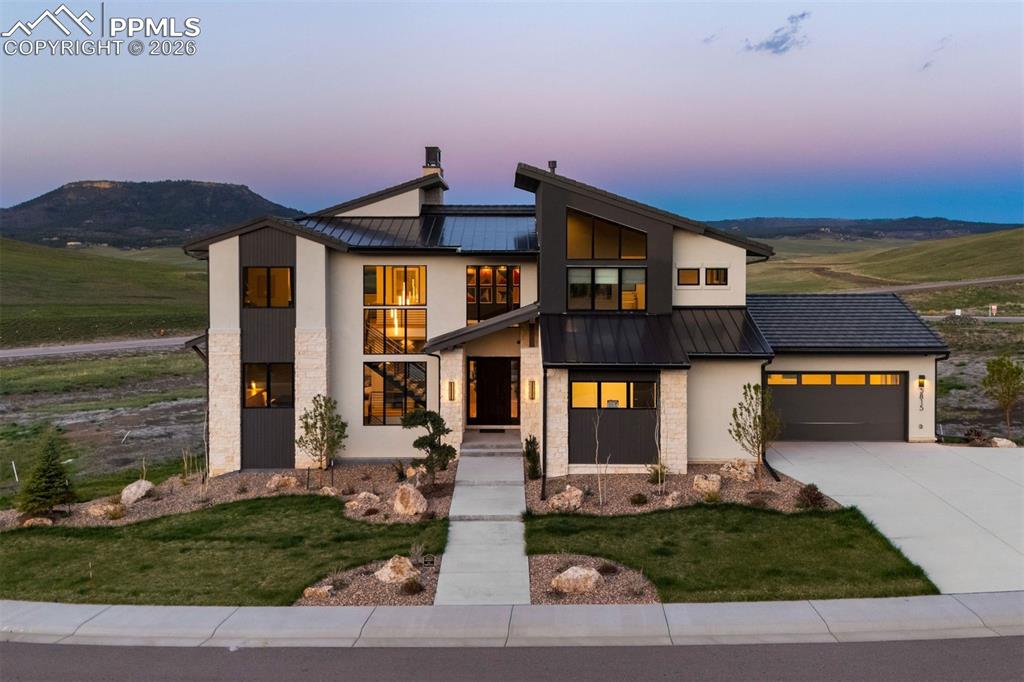 Image 1 of 37: Contemporary exterior set against open space and Dawson Butte views.