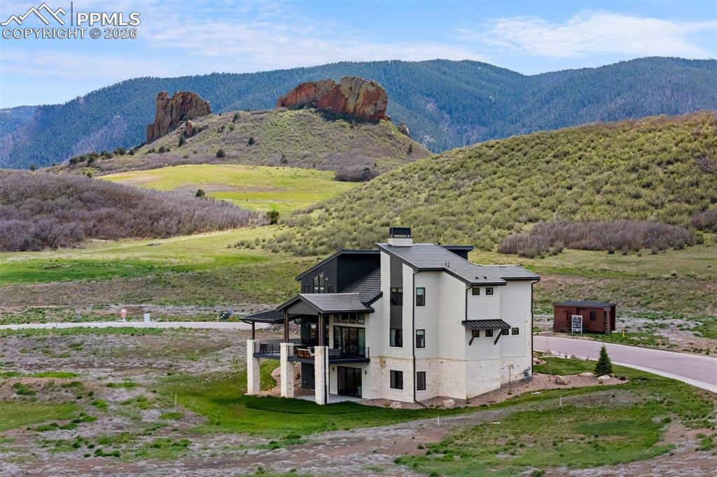 Image 2 of 37: Elevated lot positioning with expansive Colorado landscape as the backdrop.