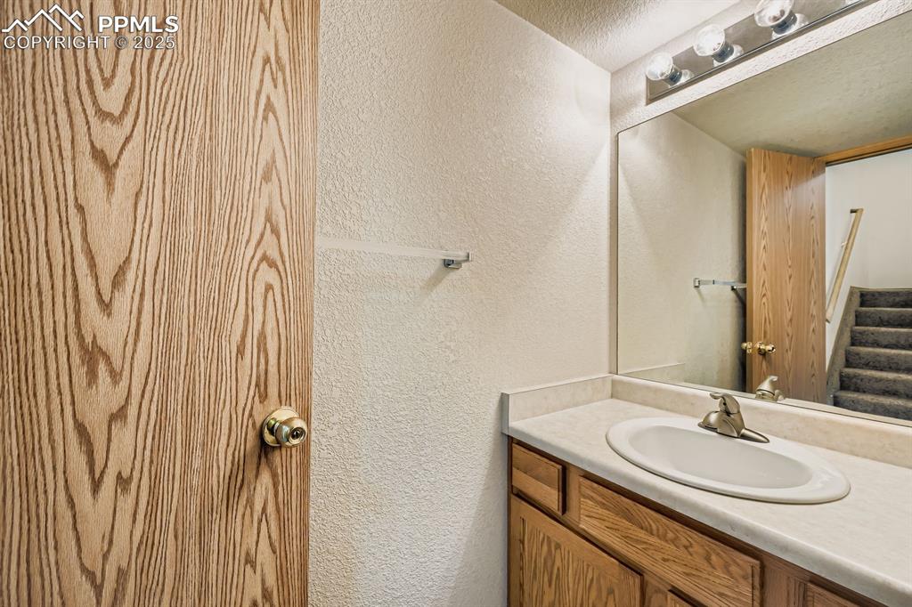 Image 16 of 43: powder room main level