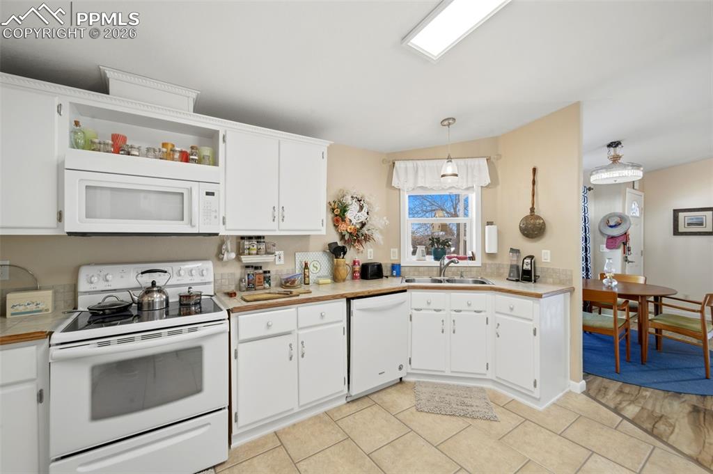 Image 11 of 37: Sunny Kitchen Views