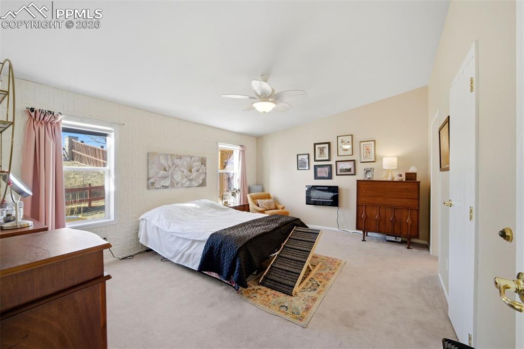 Image 20 of 37: Light-Filled Primary Bedroom