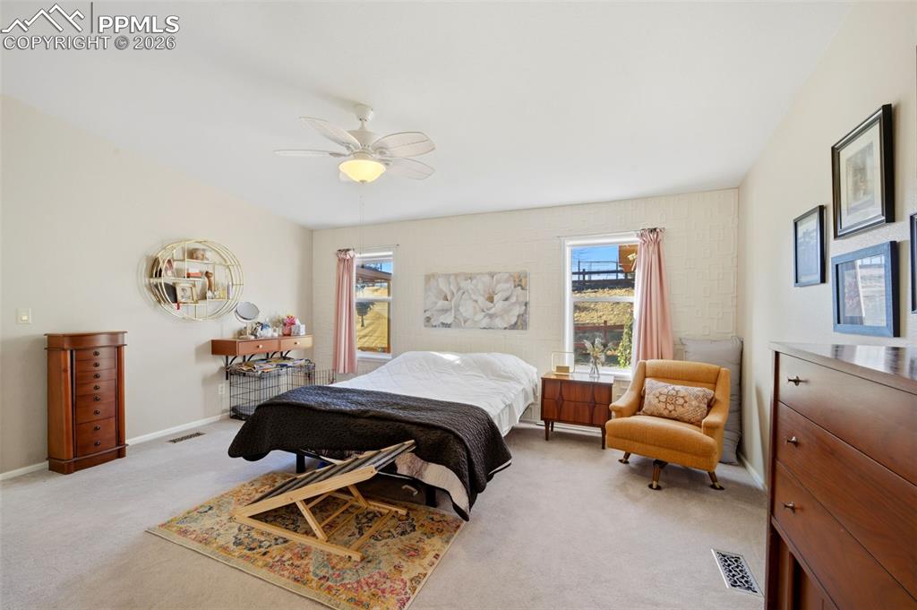 Image 21 of 37: Cozy Primary Bedroom