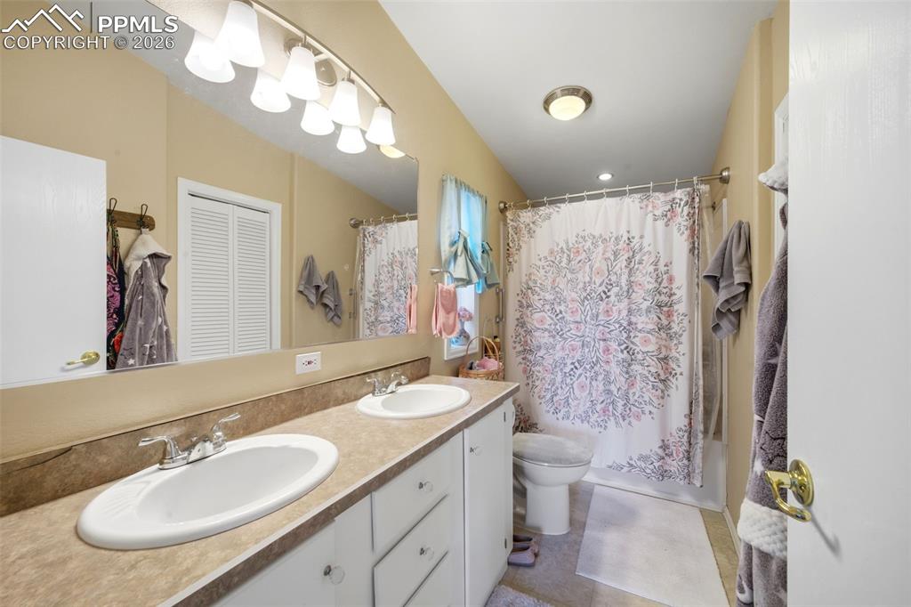 Image 22 of 37: Double Vanity Bathroom