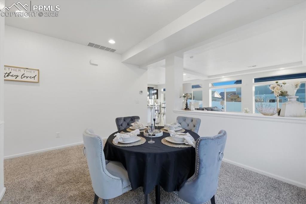 Image 11 of 41: Dining space featuring carpet and recessed lighting