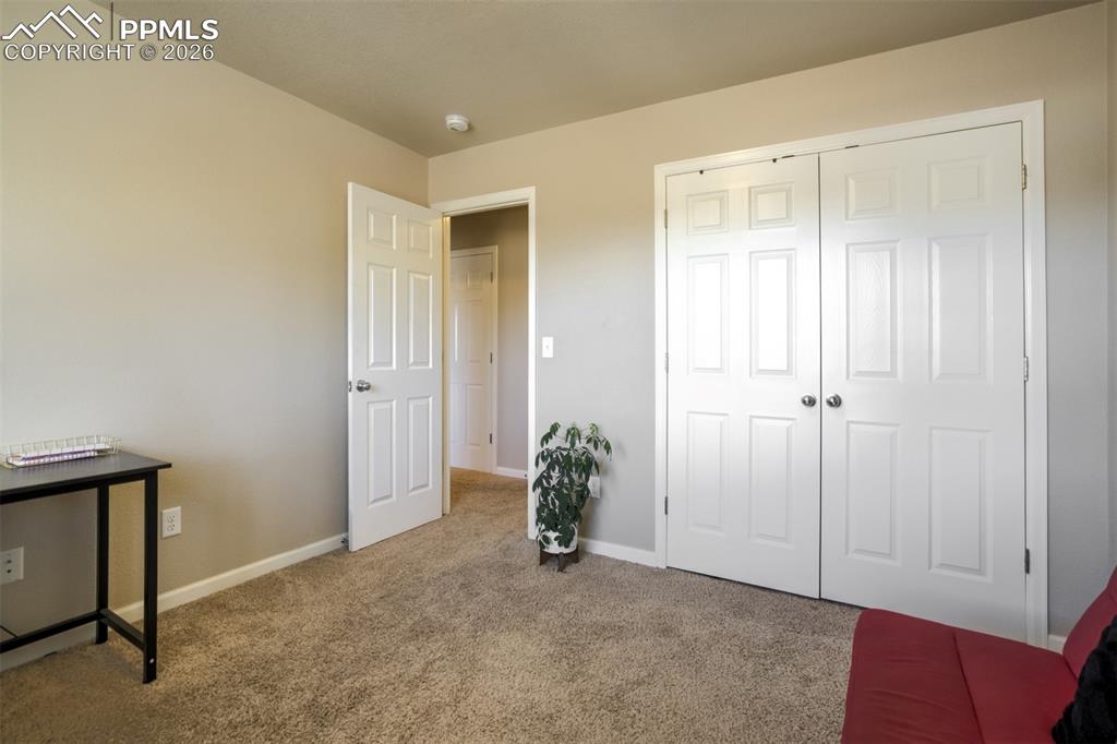 Image 28 of 50: Bright and functional space ideal for a home office, hobby room, or additio