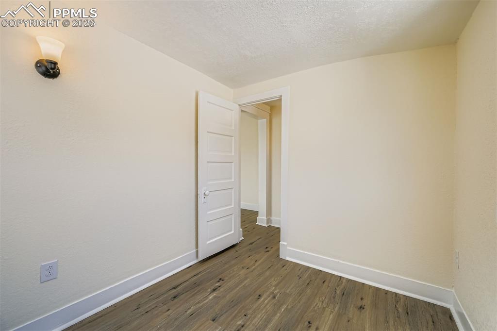 Image 19 of 34: Second bedroom or home office