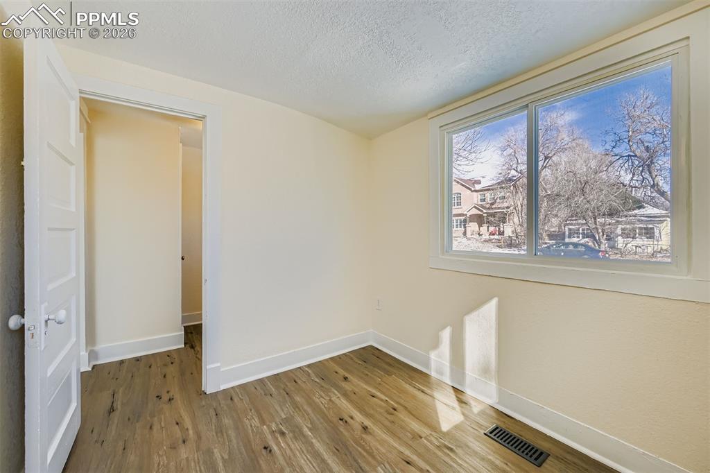 Image 20 of 34: Second bedroom or home office