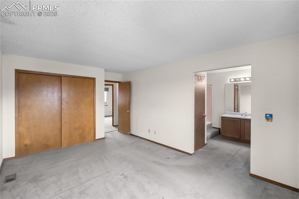 Image 21 of 39: Master Bedroom