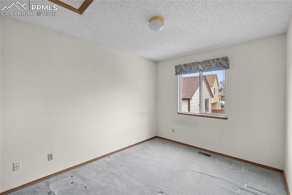 Image 24 of 39: Bedroom