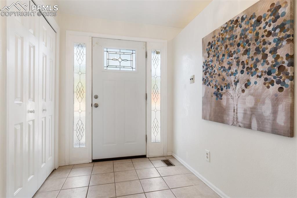 Image 7 of 50: Foyer entry with ample coat storage