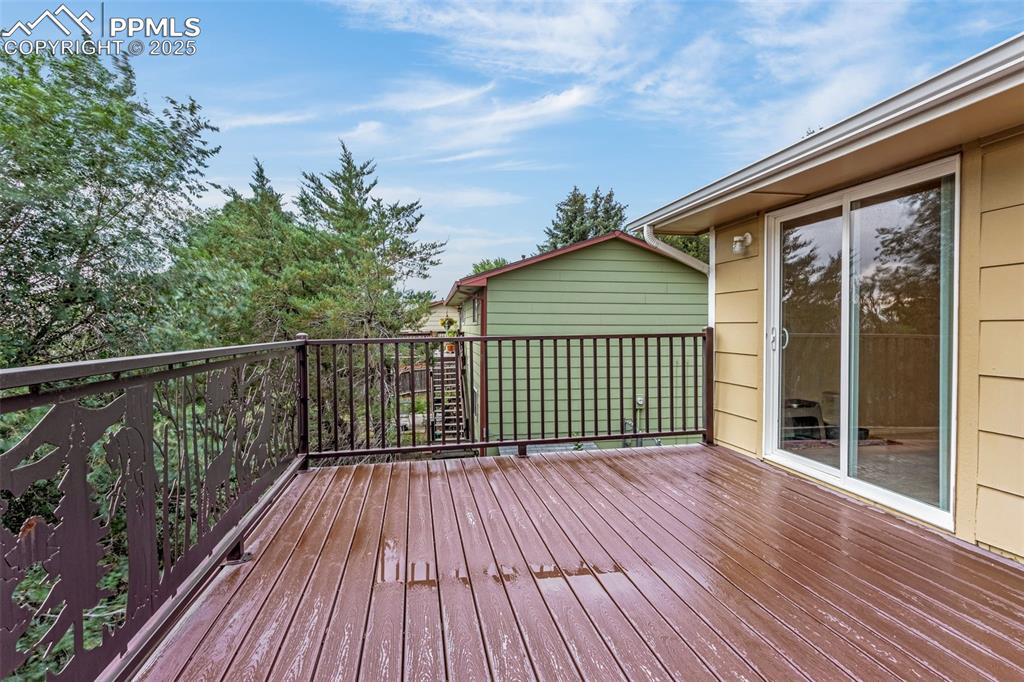 Image 8 of 38: Great deck to entertain or enjoy that morning cup of coffee! 