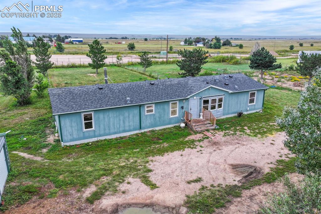 Image 4 of 38: View of front facade featuring a view of rural / pastoral area, front lawn 