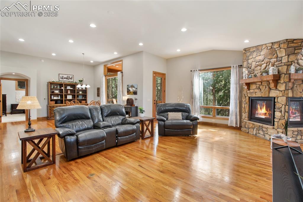 Image 12 of 49: Walk out living room open concept on main level