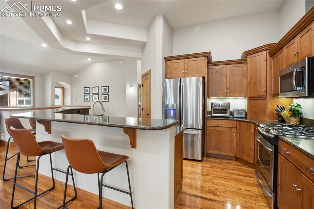 Image 16 of 49: Open concept kitchen on main level