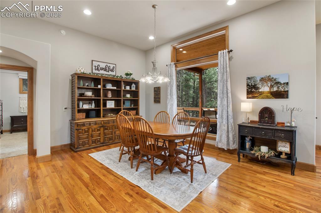 Image 17 of 49: Open concept dining room on main level