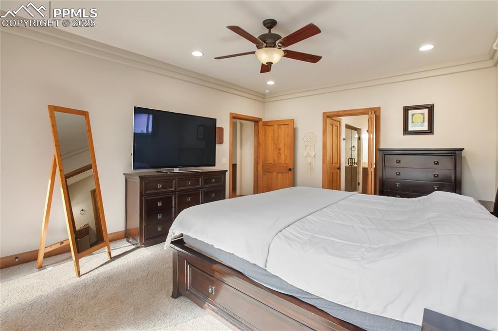 Image 21 of 49: Main level primary bedroom