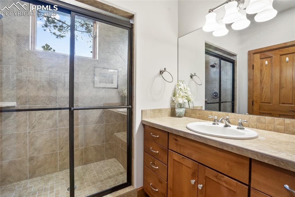 Image 30 of 49: Main level bathroom in secondary suite