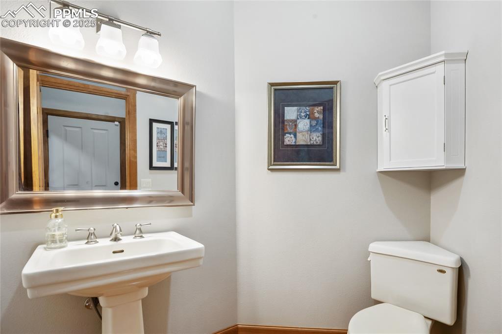 Image 31 of 49: Half bath on main level