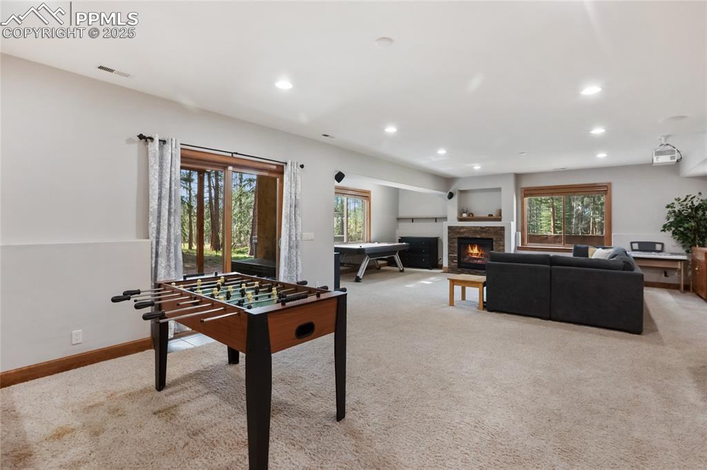 Image 34 of 49: Family room with ample space for games 