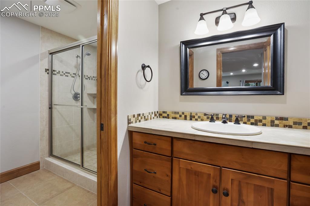 Image 43 of 49: Basement level bathroom