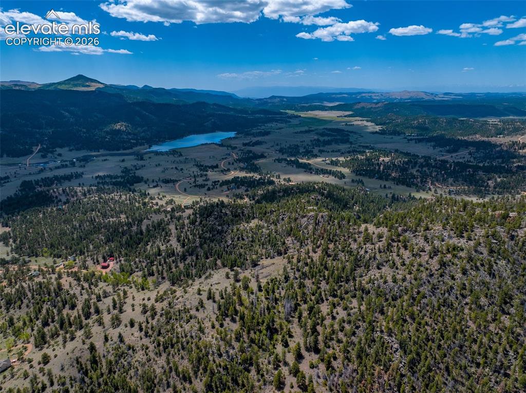 Image 11 of 50: Aerial from on property to the South. Mt Pisgah and Wright