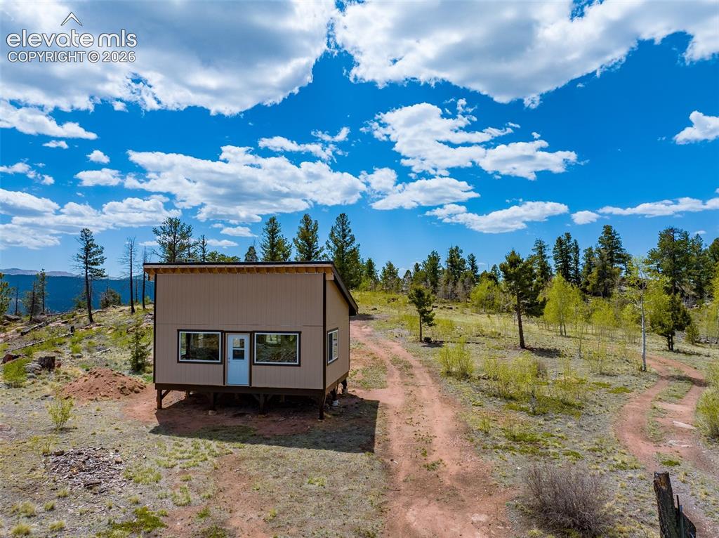 Image 14 of 50: This would make a great hunting cabin and it can be moved with a little eff