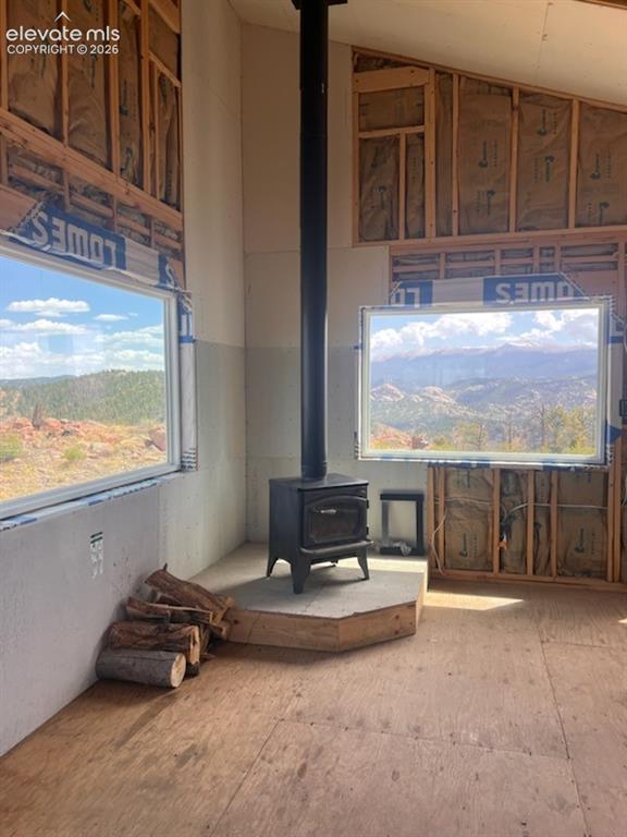 Image 20 of 50: This Wood Stove is more than adequate and keeps this Cabin toasty.