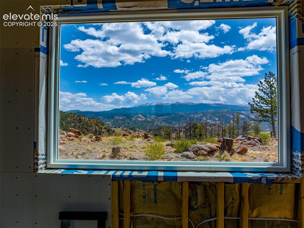 Image 21 of 50: Interior View to Pikes Peak